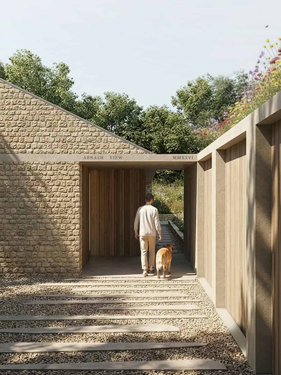 Abnash View entrance with Cotswolds stone walls, timber cladding, and wildflower green roof, net-zero Passivhaus home