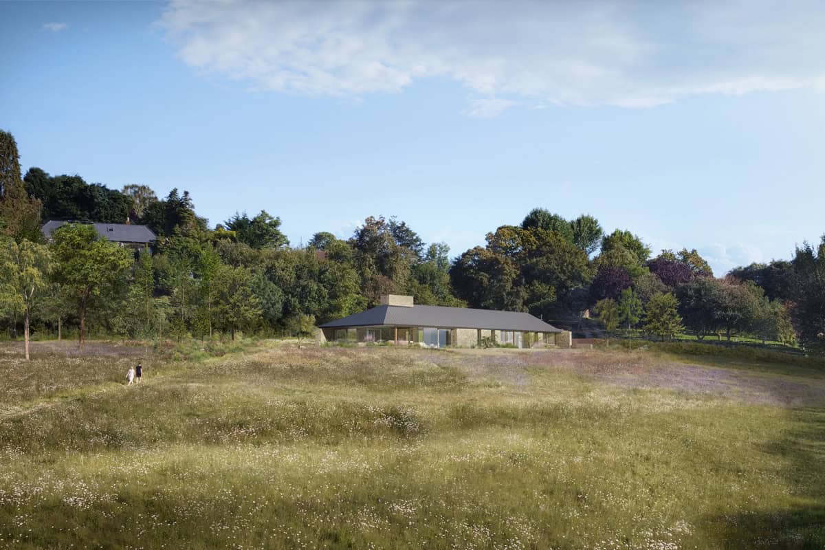 Abnash View low-profile stone and timber home nestled in a wildflower meadow with tree-lined backdrop