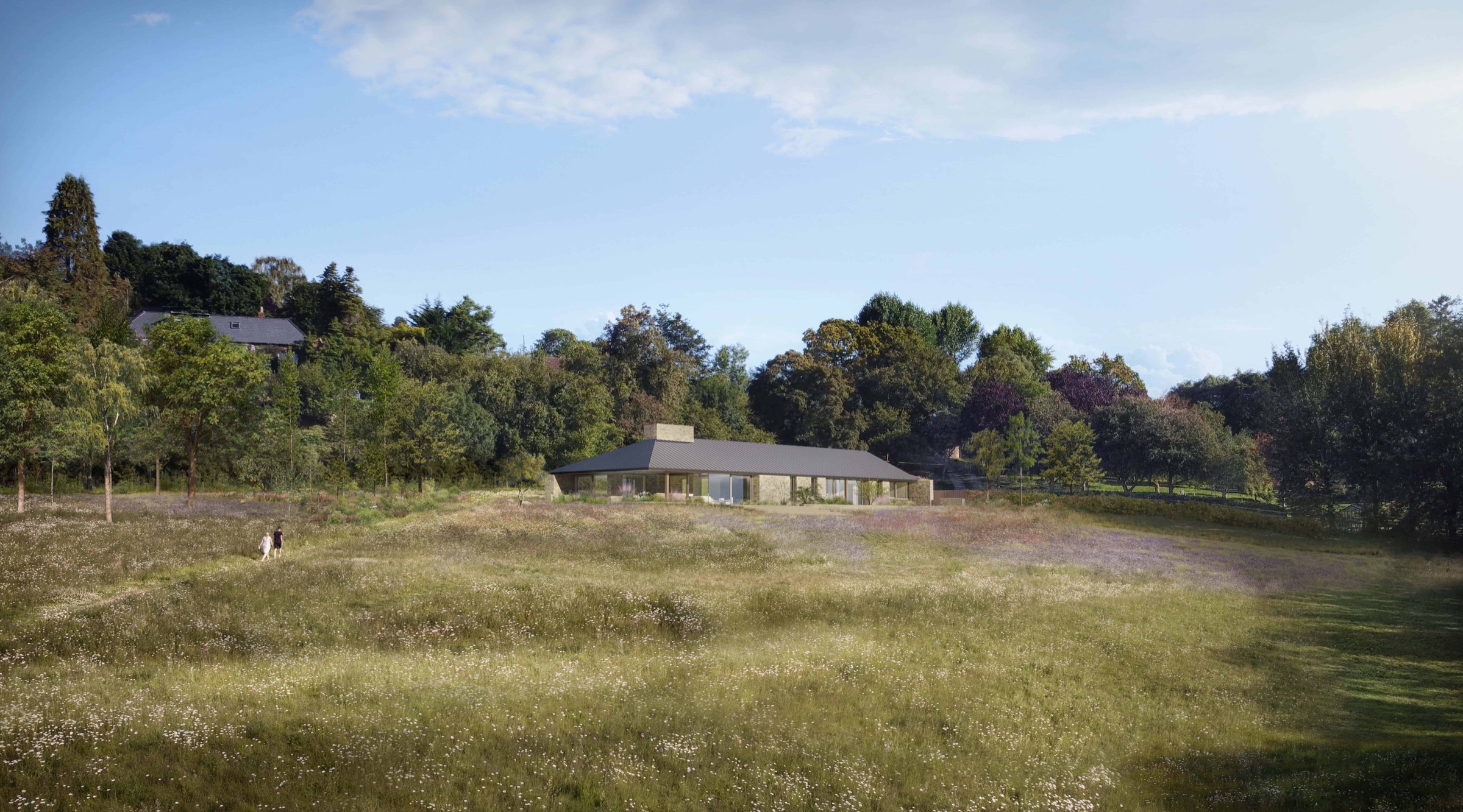 Abnash View seen from valley meadow, single-storey net-zero home nestled into Cotswolds tree line